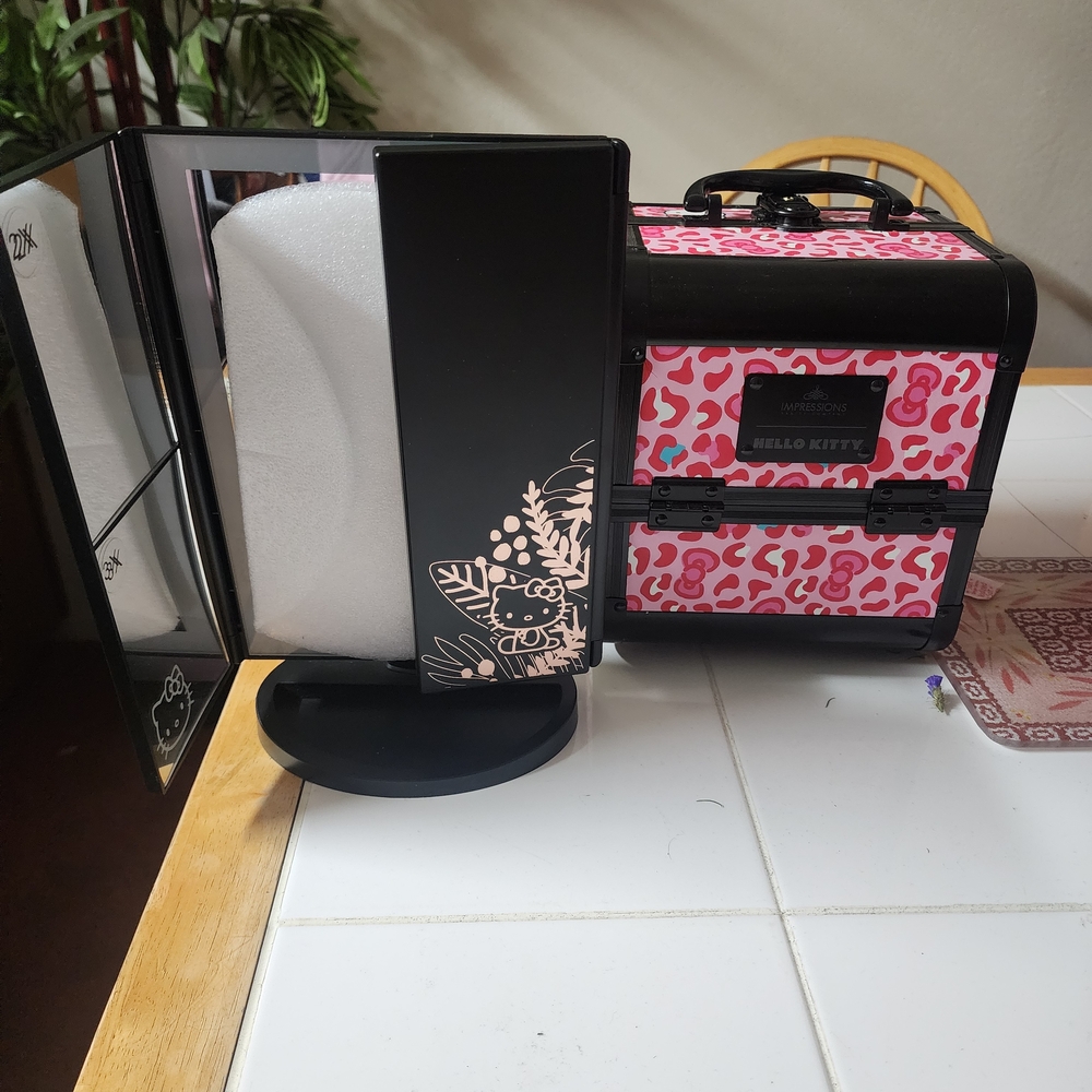 Hello Kitty Pink Leopard Carry Case with Black Trim